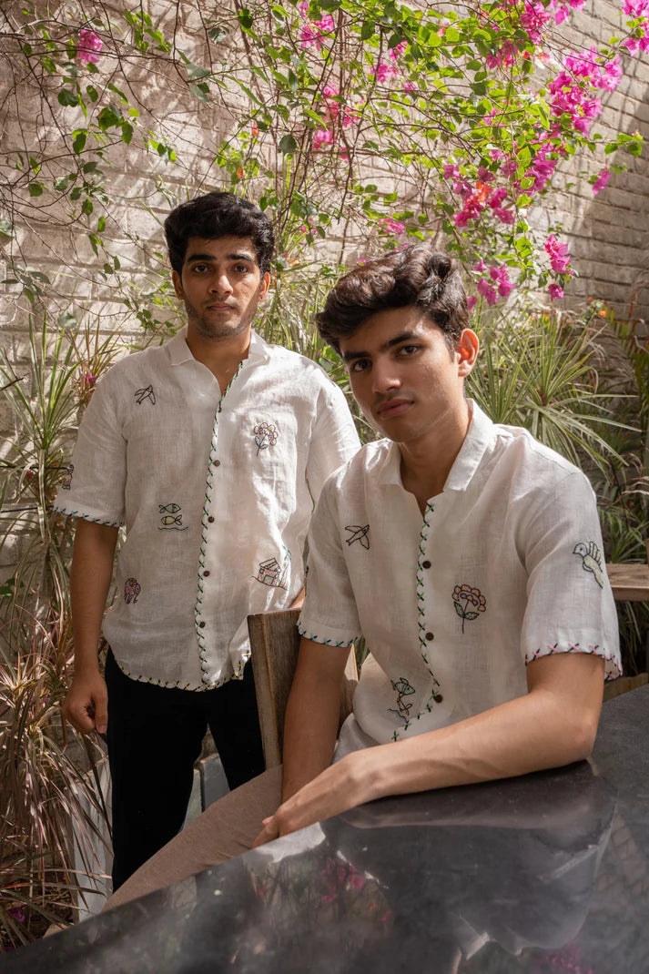 It Takes a Village Cream Coloured Shirt